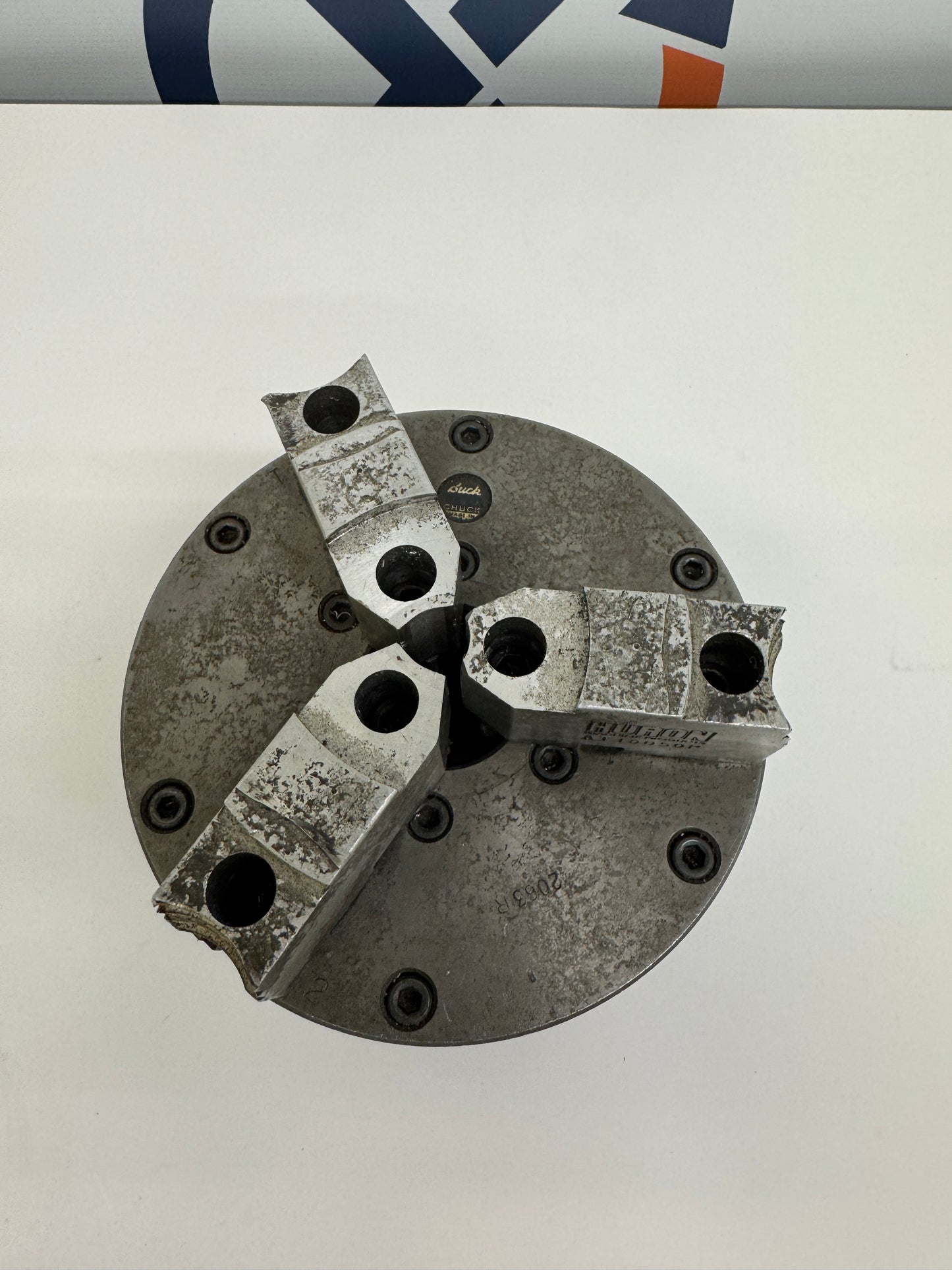 Buck Chuck Company (chuck body); Huron Machine Products Lathe Chuck 2063R | 6 in. Chuck Diameter | Orientation: Axial