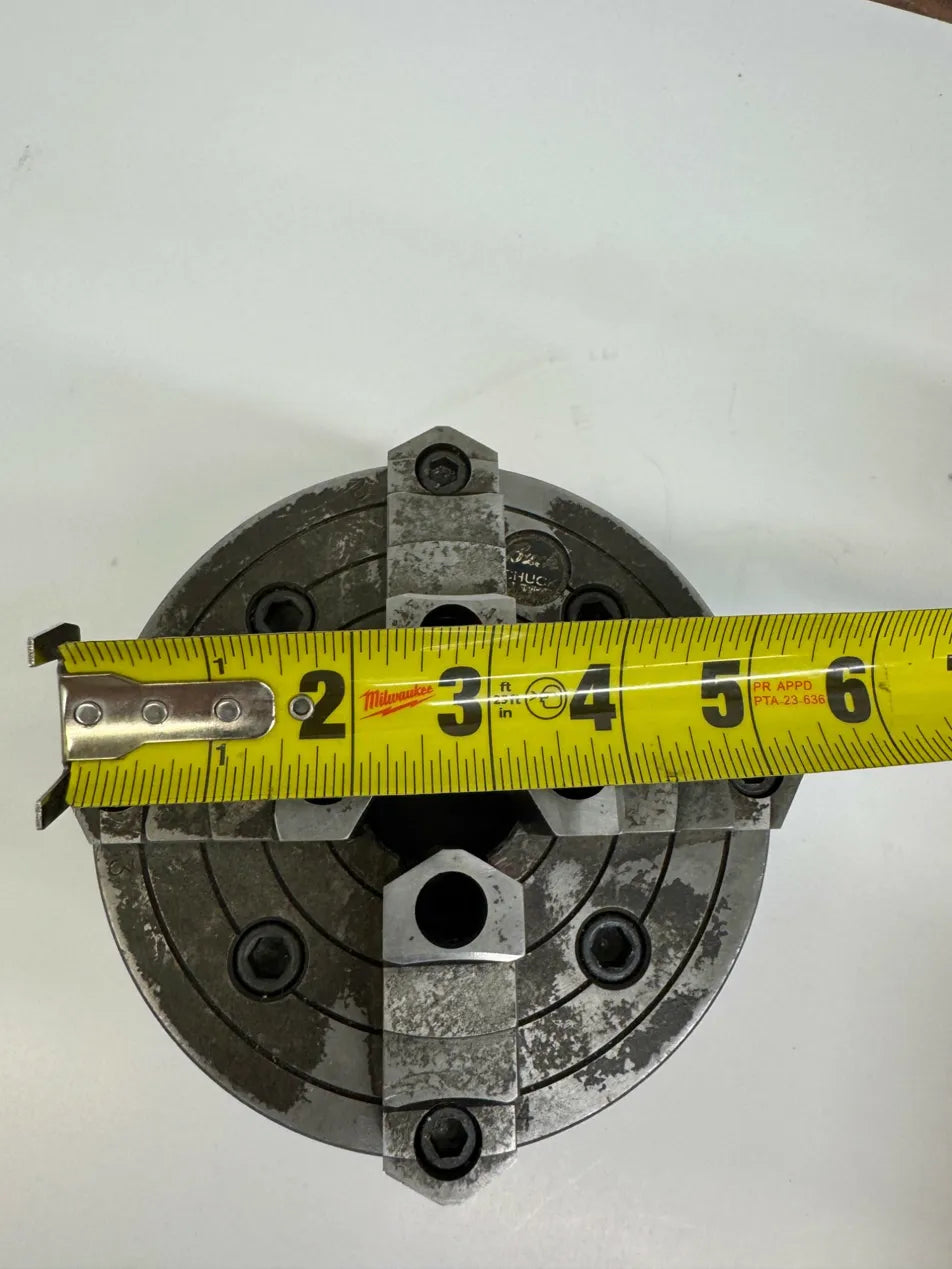 Buck Chuck Company (chuck body); Huron Machine Products Lathe Chuck 2063R | 6 in. Chuck Diameter | Orientation: Axial