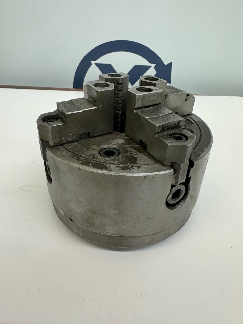 Buck Chuck Company (chuck body); Huron Machine Products Lathe Chuck 2063R | 6 in. Chuck Diameter | Orientation: Axial